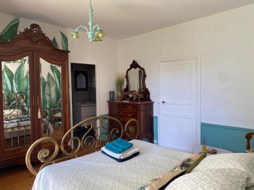La chambre Nature et son papier peint de feuillages