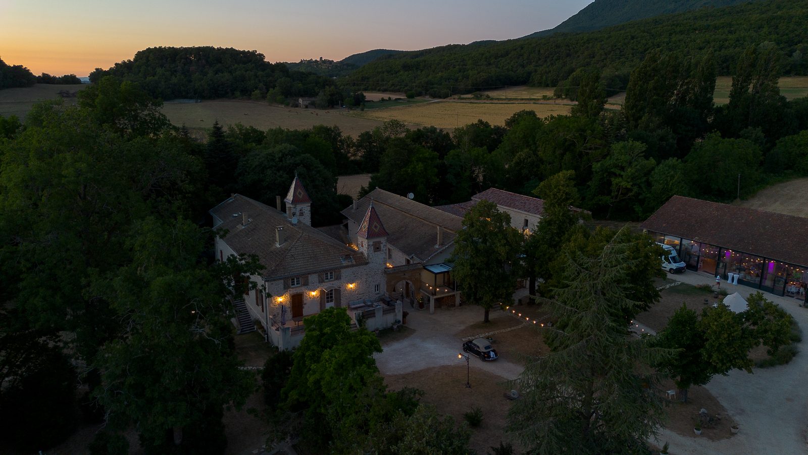 The estate seen from the air at dusk