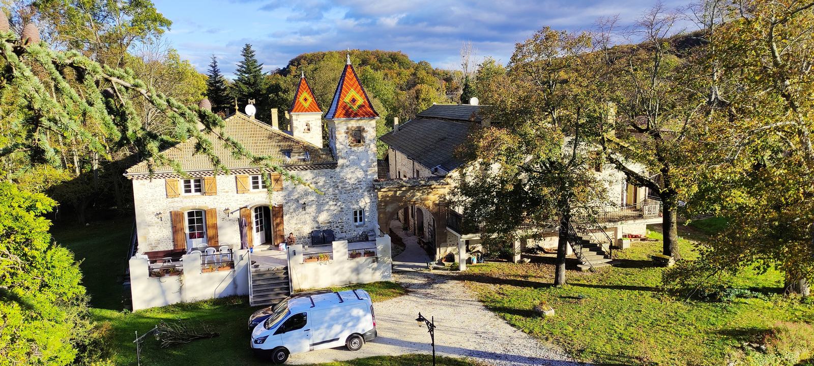 The château and its towers among the trees