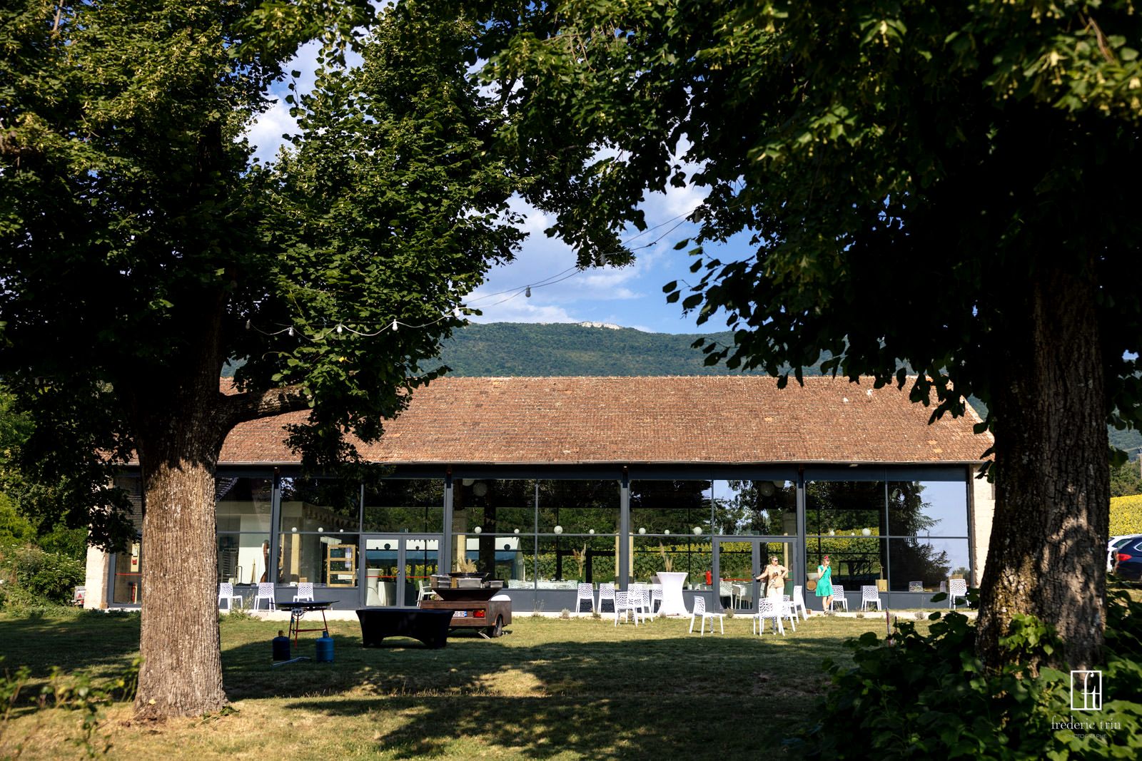 The reception hall beneath the trees in the grounds